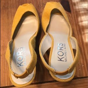 Like new Michael Kors wedges, yellow